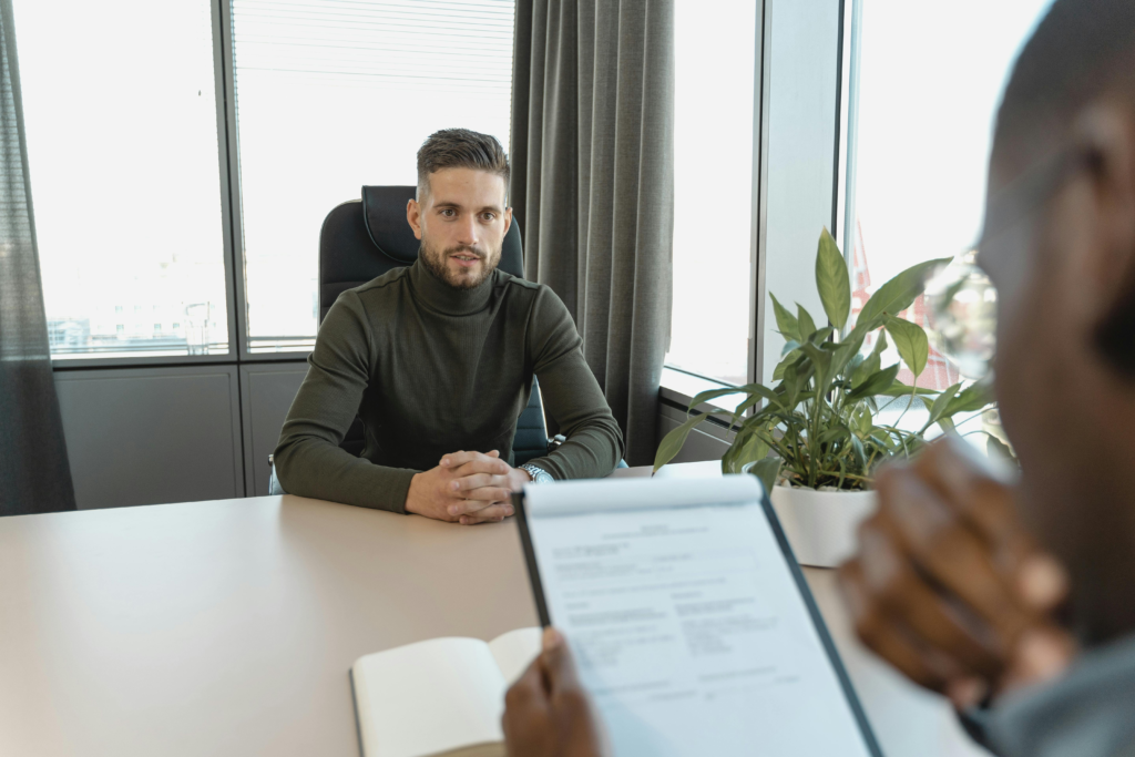 A young man is called by a company for a job interview.