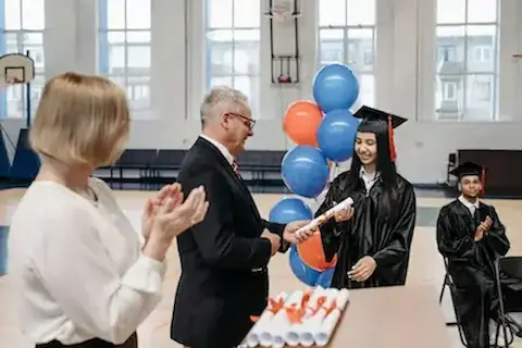 A young person receiving a job offer