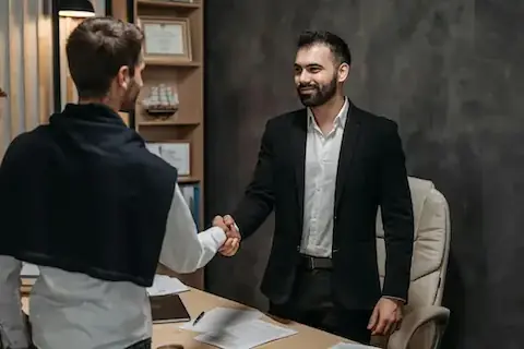 A young person receiving a job offer